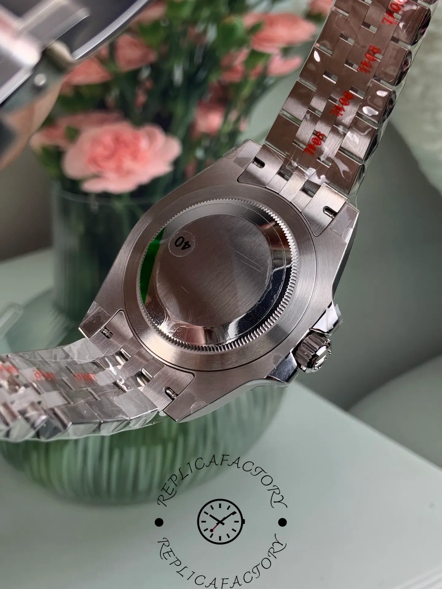 Back view of Rolex GMT-Master II 126710BLRO showing solid caseback and Jubilee bracelet underside.