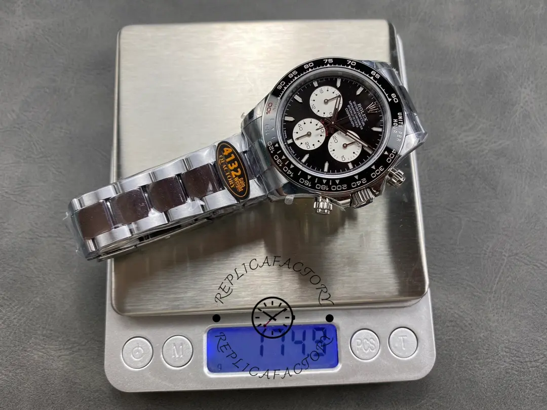 Rolex Daytona 126529LN 40MM on scale, weight display visible beside the watch.