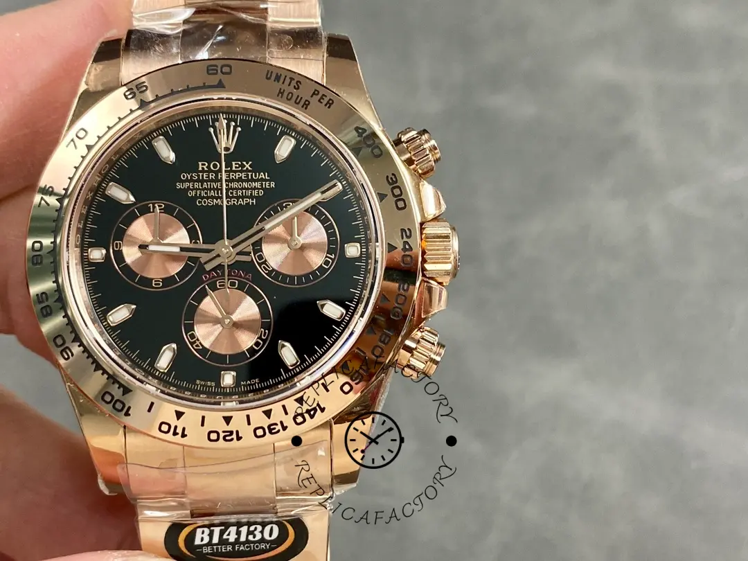Handheld view of Rolex Daytona 126505-0001, black dial on rose gold Oyster bracelet.