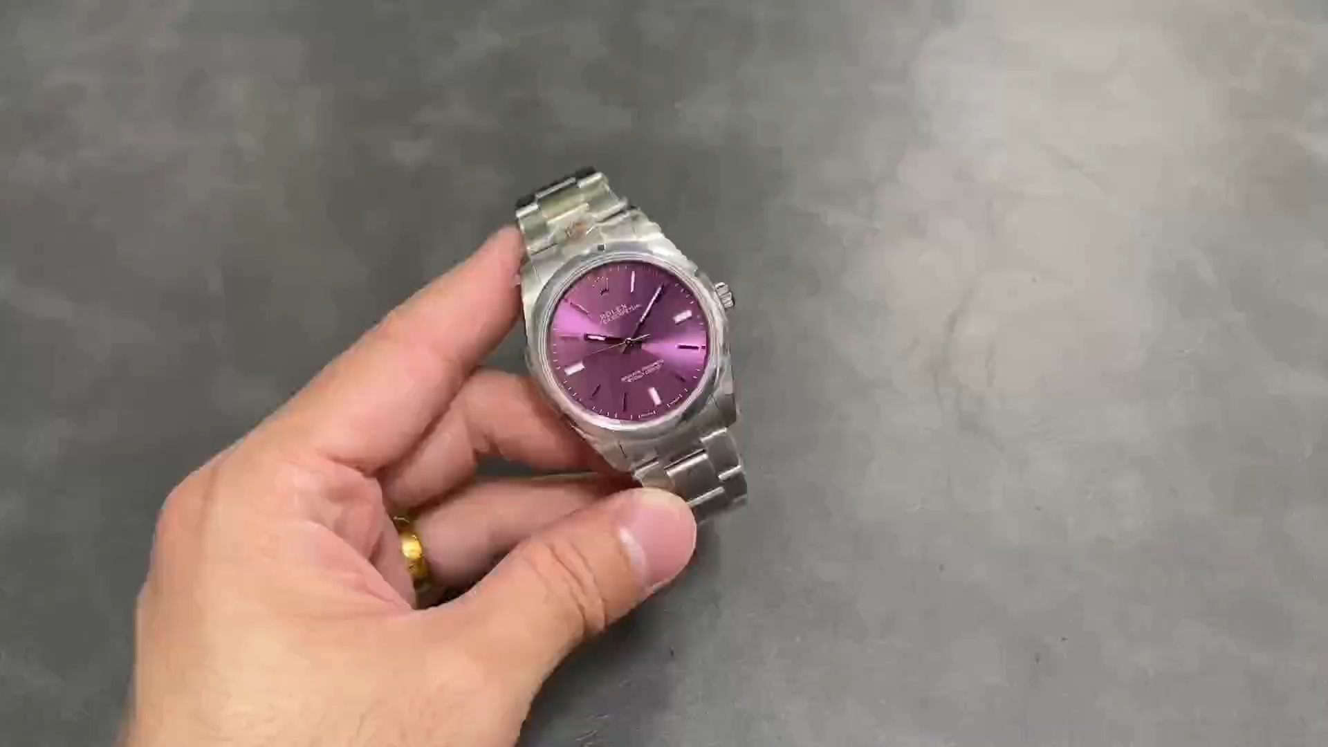 Replica Rolex Oyster Perpetual 39 Red Grape Dial Steel 114300 0002 Men's Watch